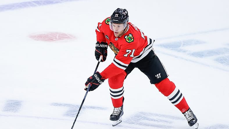Oct 3, 2023; Chicago, Illinois, USA; Chicago Blackhawks left wing Taylor Hall (71) controls the puck against the Detroit Red Wings during the second period of a preseason hockey game at United Center. Mandatory Credit: Kamil Krzaczynski-USA TODAY Sports