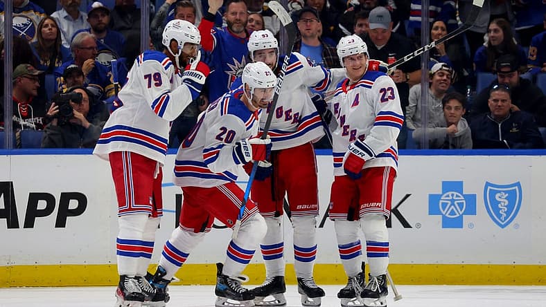 Oct 12, 2023; Buffalo, New York, USA; New York Rangers left wing Chris Kreider (20) celebrates his goal with teammates during the third period against the Buffalo Sabres at KeyBank Center. Mandatory Credit: Timothy T. Ludwig-USA TODAY Sports
