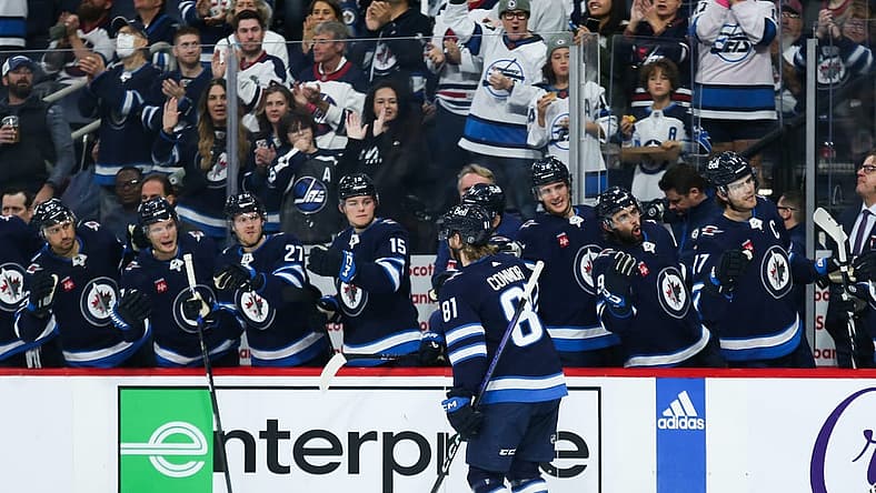 Oct 14, 2023; Winnipeg, Manitoba, CAN; Winnipeg Jets forward Kyle Connor (81) is celebrates with teammates after scoring a goal against the Florida Panthers during the second period at Canada Life Centre. Mandatory Credit: Terrence Lee-USA TODAY Sports