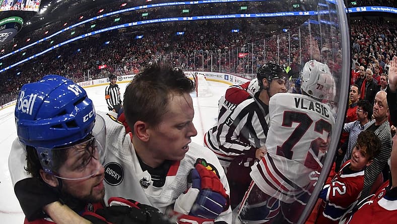 Oct 14, 2023; Montreal, Quebec, CAN; Montreal Canadiens forward Josh Anderson (17) and Chicago Blackhawks defenseman Jarred Tinordi (25) during the first period at the Bell Centre. Mandatory Credit: Eric Bolte-USA TODAY Sports