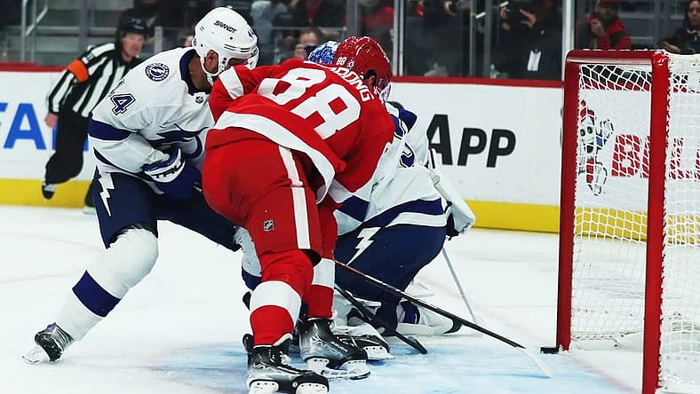 Oct 14, 2023; Detroit, Michigan, USA; Detroit Red Wings right wing Daniel Sprong scores against Tampa Bay Lightning goaltender Jonas Johansson during first-period action on Saturday, Oct. 14, 2023, in Detroit, Michigan. Mandatory Credit: Kirthmon F. Dozier-USA TODAY Sports