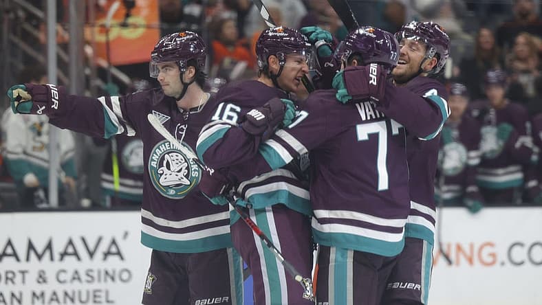 Oct 15, 2023; Anaheim, California, USA; Anaheim Ducks right wing Frank Vatrano (77) celebrates with Anaheim Ducks center Ryan Strome (16) after scoring a goal during the second period at Honda Center. Mandatory Credit: Yannick Peterhans-USA TODAY Sports