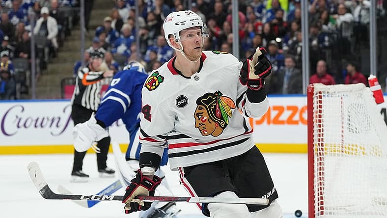 Oct 16, 2023; Toronto, Ontario, CAN; Chicago Blackhawks right wing Corey Perry (94) points to the crowd after scoring a goal against the Toronto Maple Leafs during the second period at Scotiabank Arena. Mandatory Credit: Nick Turchiaro-USA TODAY Sports