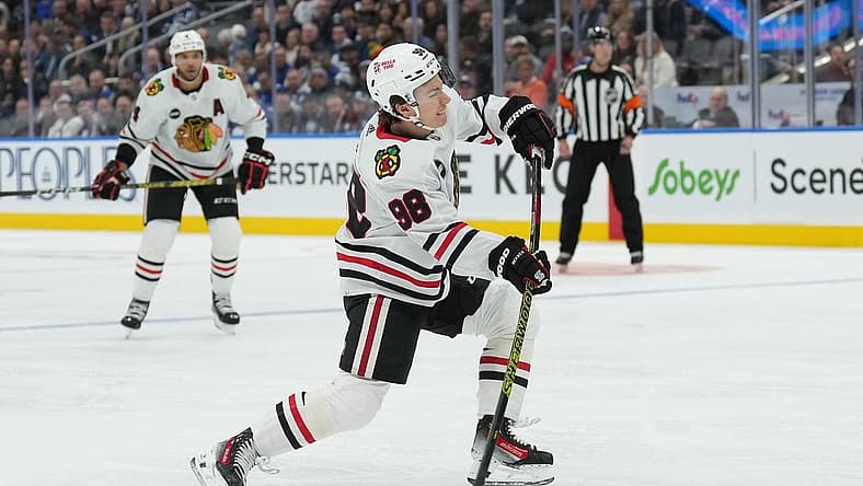 Oct 16, 2023; Toronto, Ontario, CAN; Chicago Blackhawks center Connor Bedard (98) shoots the puck on net against the Toronto Maple Leafs during the second period at Scotiabank Arena. Mandatory Credit: Nick Turchiaro-USA TODAY Sports