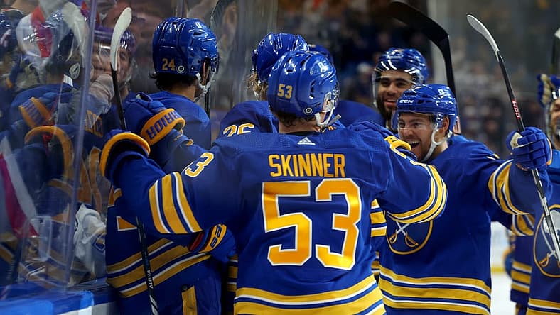 Oct 17, 2023; Buffalo, New York, USA; Buffalo Sabres center Dylan Cozens (24) celebrates his overtime goal with teammates against the Tampa Bay Lightning at KeyBank Center. Mandatory Credit: Timothy T. Ludwig-USA TODAY Sports