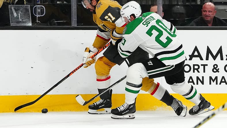 Oct 17, 2023; Las Vegas, Nevada, USA; Vegas Golden Knights right wing Mark Stone (61) skates against Dallas Stars defenseman Ryan Suter (20) during the first period at T-Mobile Arena. Mandatory Credit: Stephen R. Sylvanie-USA TODAY Sports