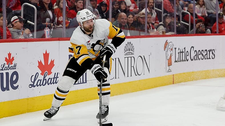 Oct 18, 2023; Detroit, Michigan, USA; Pittsburgh Penguins right wing Bryan Rust (17) skates with the puck in the third period against the Detroit Red Wings at Little Caesars Arena. Mandatory Credit: Rick Osentoski-USA TODAY Sports