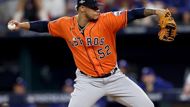 Oct 20, 2023; Arlington, Texas, USA; Houston Astros pitcher Bryan Abreu (52) throws during the eighth inning of game five in the ALCS against the Texas Rangers for the 2023 MLB playoffs at Globe Life Field. Mandatory Credit: Andrew Dieb-USA TODAY Sports