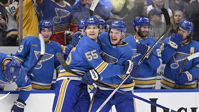 Oct 21, 2023; St. Louis, Missouri, USA; St. Louis Blues right wing Alexey Toropchenko (13) reacts on a goal by defenseman Colton Parayko (55) against the Pittsburgh Penguins during the second period at Enterprise Center. Mandatory Credit: Jeff Le-USA TODAY Sports
