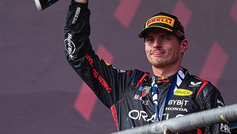 Oracle Red Bull Racing driver Max Verstappen hoists the trophy after winning the Formula 1 Lenovo United States Grand Prix at Circuit of Americas on Sunday Oct. 22, 2023.