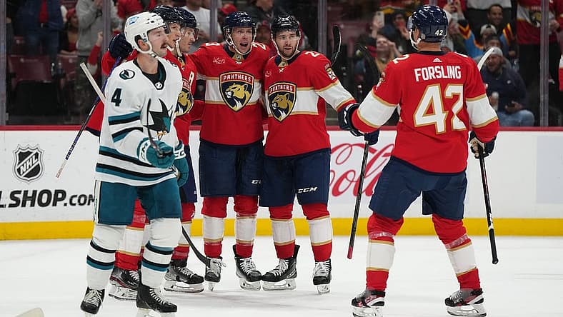 Oct 24, 2023; Sunrise, Florida, USA; Florida Panthers center Carter Verhaeghe (23) celebrates his goal against the San Jose Sharks with teammates on the ice during the second period at Amerant Bank Arena. Mandatory Credit: Jasen Vinlove-USA TODAY Sports