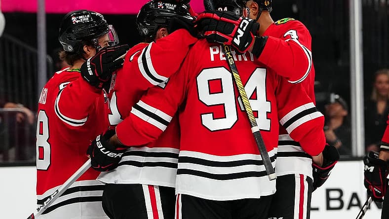 Oct 27, 2023; Las Vegas, Nevada, USA; Chicago Blackhawks players celebrate after defeating the Vegas Golden Knights 4-3 in overtime at T-Mobile Arena. Mandatory Credit: Stephen R. Sylvanie-USA TODAY Sports
