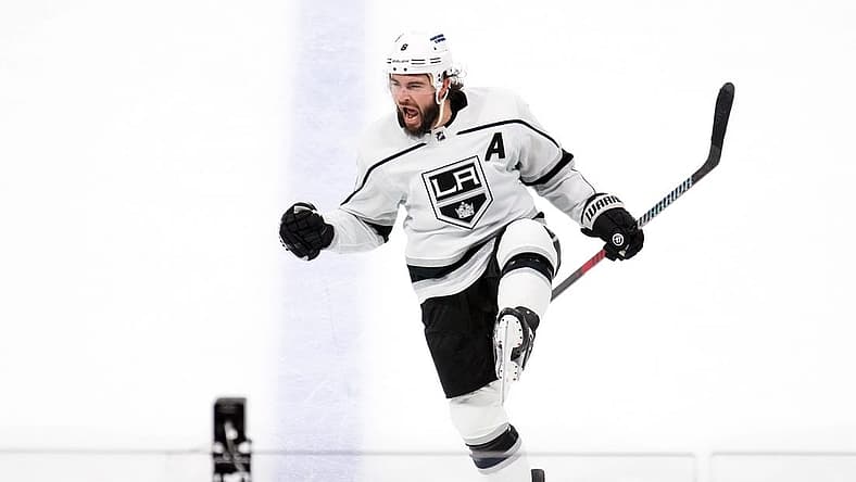 Oct 27, 2023; Tempe, Arizona, USA; Los Angeles Kings defenseman Drew Doughty (8) celebrates a goal against the Arizona Coyotes during the third period at Mullett Arena. Mandatory Credit: Joe Camporeale-USA TODAY Sports