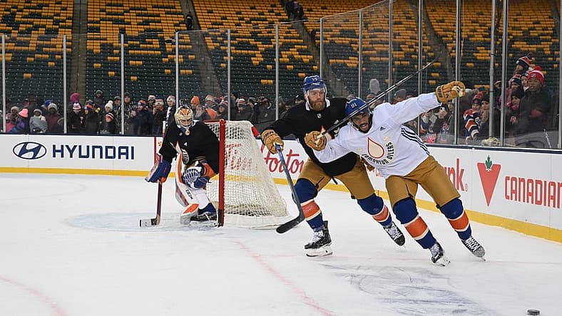 Oct 28, 2023; Edmonton, Alberta, Canada; Edmonton Oilers left winger Evander Kane (91) with Oilers defenceman Mattias Ekholm (14) are seen out on the ice during practice day for the 2023 Heritage Classic ice hockey game at Commonwealth Stadium. Mandatory Credit: Walter Tychnowicz-USA TODAY Sports