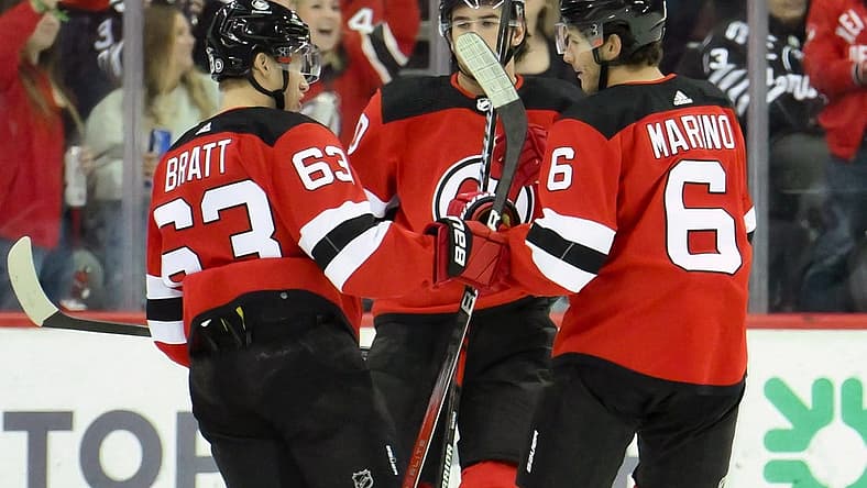 Oct 29, 2023; Newark, New Jersey, USA; New Jersey Devils left wing Jesper Bratt (63) celebrates with teammates after scoring a goal against the Minnesota Wild during the first period at Prudential Center. Mandatory Credit: John Jones-USA TODAY Sports