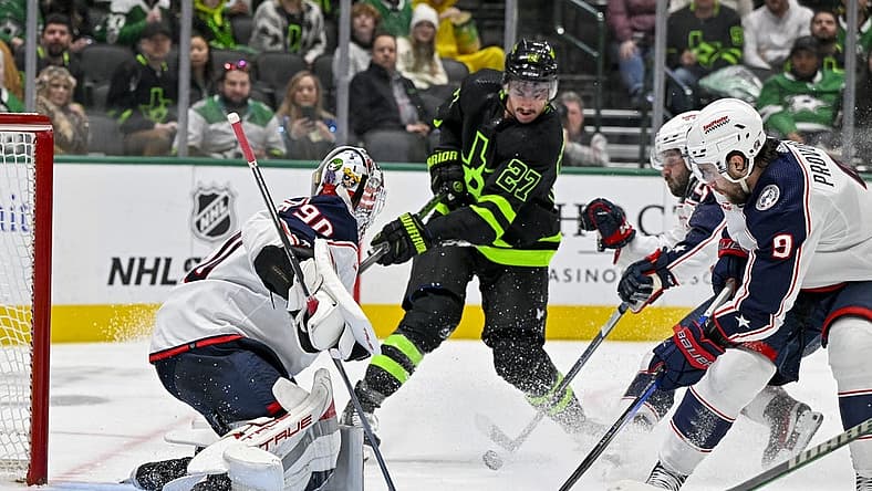 Oct 30, 2023; Dallas, Texas, USA; Columbus Blue Jackets goaltender Elvis Merzlikins (90) stops a shot by Dallas Stars left wing Mason Marchment (27) during the second period at the American Airlines Center. Mandatory Credit: Jerome Miron-USA TODAY Sports
