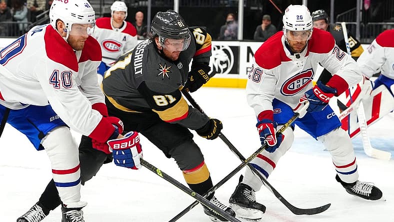 Oct 30, 2023; Las Vegas, Nevada, USA; Vegas Golden Knights right wing Jonathan Marchessault (81) skates between Montreal Canadiens right wing Joel Armia (40) and Montreal Canadiens defenseman Johnathan Kovacevic (26) during the second period at T-Mobile Arena. Mandatory Credit: Stephen R. Sylvanie-USA TODAY Sports