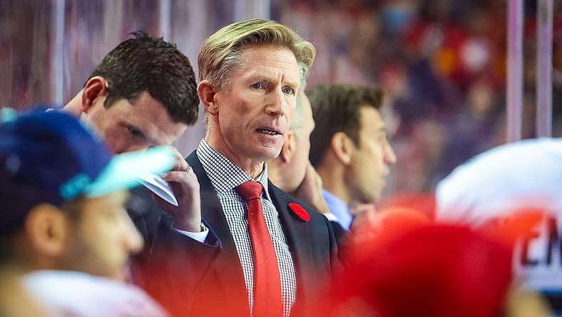 Nov 1, 2022; Calgary, Alberta, CAN; Seattle Kraken head coach Dave Hakstol on his bench against the Calgary Flames during the second period at Scotiabank Saddledome. Mandatory Credit: Sergei Belski-USA TODAY Sports