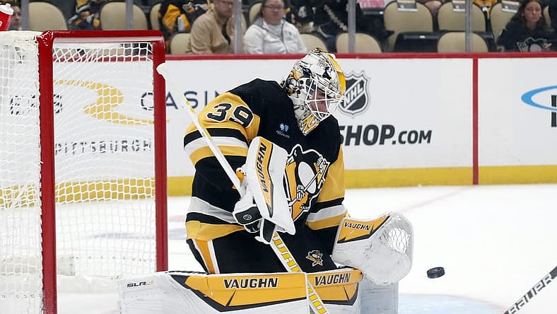 Sep 24, 2023; Pittsburgh, Pennsylvania, USA; Pittsburgh Penguins goalie Alex Nedeljkovic (39) makes a save against the Columbus Blue Jackets during the first period at PPG Paints Arena. Mandatory Credit: Charles LeClaire-USA TODAY Sports
