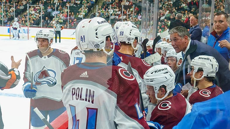 Sep 28, 2023; Saint Paul, Minnesota, USA; Colorado Avalanche head coach Jared Bednar talks with the team during a break against the Minnesota Wild in the third period at Xcel Energy Center. Mandatory Credit: Matt Blewett-USA TODAY Sports