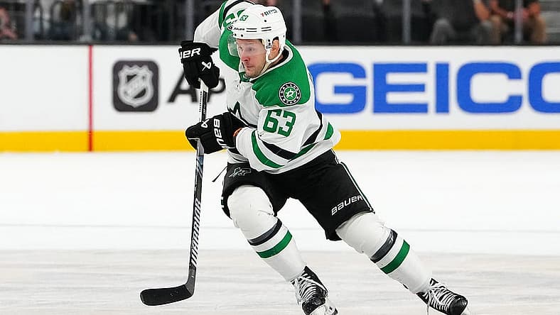 Oct 17, 2023; Las Vegas, Nevada, USA; Dallas Stars right wing Evgenii Dadonov (63) skates against the Vegas Golden Knights during an overtime period at T-Mobile Arena. Mandatory Credit: Stephen R. Sylvanie-USA TODAY Sports