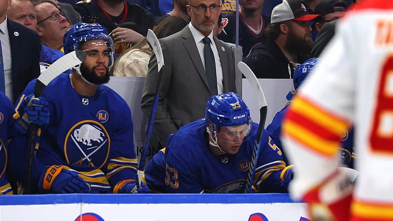 Oct 19, 2023; Buffalo, New York, USA; Buffalo Sabres head coach Don Granato watches his team play during the second period against the Calgary Flames at KeyBank Center. Mandatory Credit: Timothy T. Ludwig-USA TODAY Sports