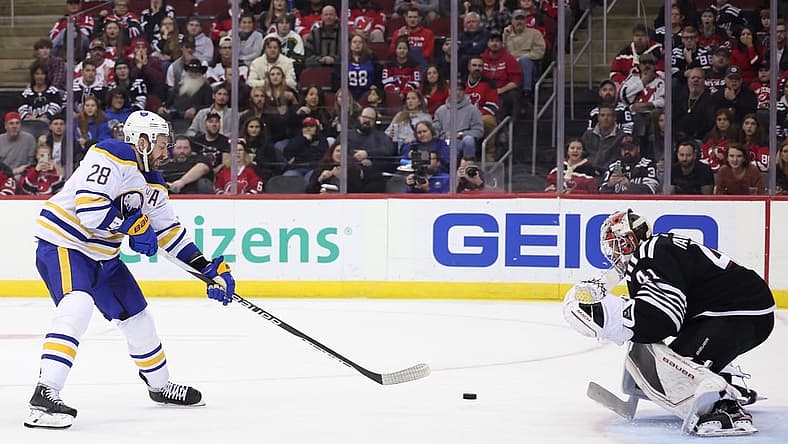 Oct 27, 2023; Newark, New Jersey, USA; New Jersey Devils goaltender Vitek Vanecek (41) makes a save against Buffalo Sabres left wing Zemgus Girgensons (28) during the second period at Prudential Center. Mandatory Credit: Vincent Carchietta-USA TODAY Sports