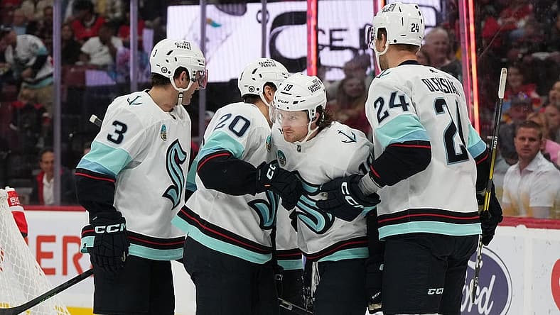 Oct 28, 2023; Sunrise, Florida, USA; Seattle Kraken left wing Jared McCann (19) celebrates his goal against the Florida Panthers with teammates on the ice during the first period at Amerant Bank Arena. Mandatory Credit: Jasen Vinlove-USA TODAY Sports