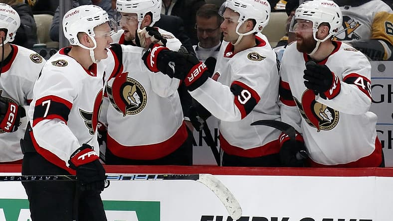 Oct 28, 2023; Pittsburgh, Pennsylvania, USA; Ottawa Senators left wing Brady Tkachuk (7) celebrates with the bench after scoring his second goal of the game against the Pittsburgh Penguins during the third period at PPG Paints Arena. Ottawa won 5-2. Mandatory Credit: Charles LeClaire-USA TODAY Sports