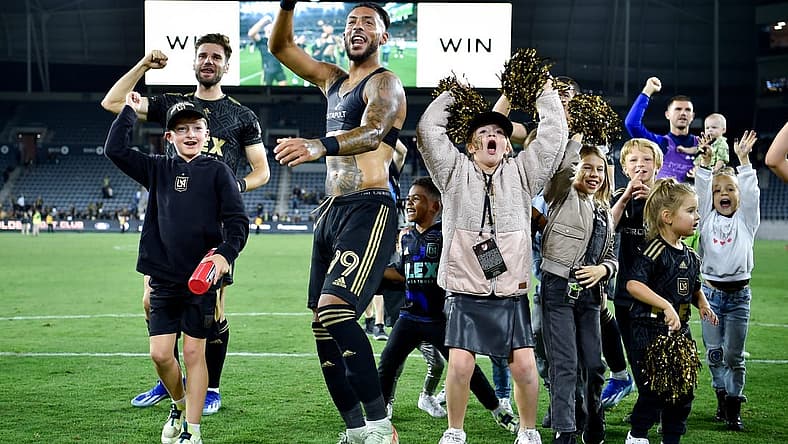 Oct 28, 2023; Los Angeles, CA, USA; Los Angeles FC forward Denis Bouanga (99) celebrates on the field after the match against the Vancouver Whitecaps FC in game one in a round one match of the 2023 MLS Cup Playoffs at BMO Stadium. Mandatory Credit: Jon Durr-USA TODAY Sports