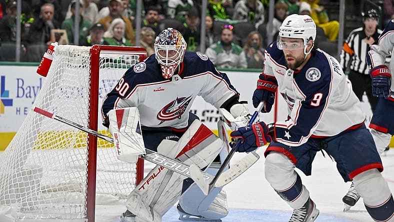 Oct 30, 2023; Dallas, Texas, USA; Columbus Blue Jackets goaltender Elvis Merzlikins (90) and defenseman Ivan Provorov (9) faces the Dallas Stars attack during the second period at the American Airlines Center. Mandatory Credit: Jerome Miron-USA TODAY Sports