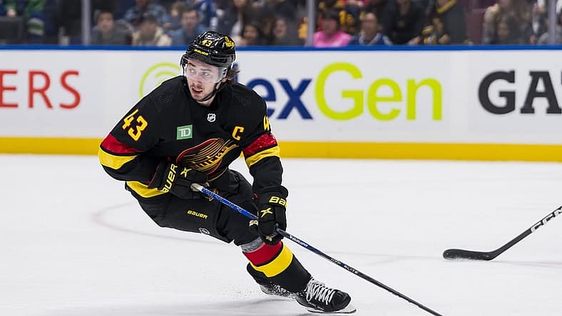 Oct 31, 2023; Vancouver, British Columbia, CAN; Vancouver Canucks defenseman Quinn Hughes (43) handles the puck against the Nashville Predators in the first period at Rogers Arena. Mandatory Credit: Bob Frid-USA TODAY Sports