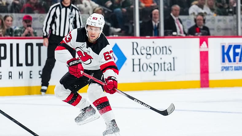Nov 2, 2023; Saint Paul, Minnesota, USA; New Jersey Devils left wing Jesper Bratt (63) passes during the first period against the Minnesota Wild at Xcel Energy Center. Mandatory Credit: Brace Hemmelgarn-USA TODAY Sports