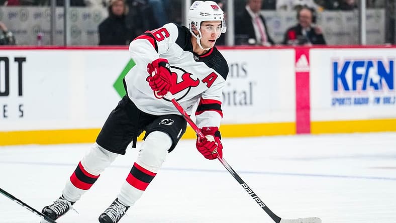 Nov 2, 2023; Saint Paul, Minnesota, USA; New Jersey Devils center Jack Hughes (86) passes during the first period against the Minnesota Wild at Xcel Energy Center. Mandatory Credit: Brace Hemmelgarn-USA TODAY Sports