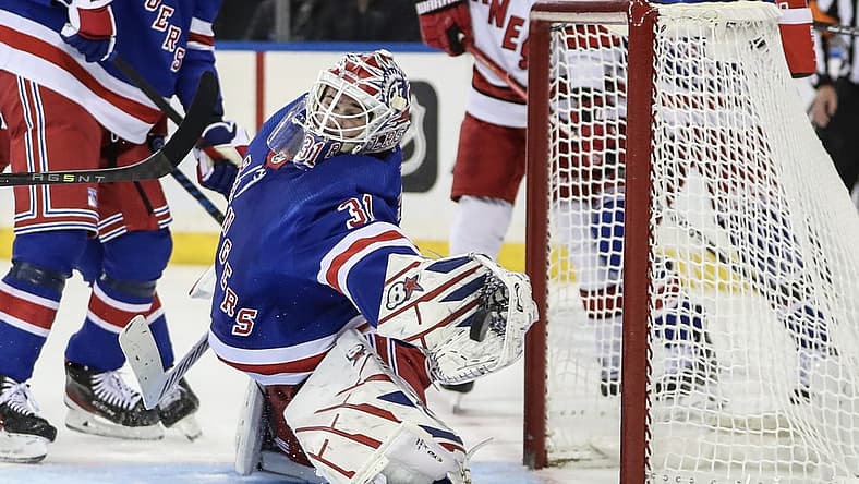 Nov 2, 2023; New York, New York, USA; New York Rangers goaltender Igor Shesterkin (31) makes a save on a shot on goal attempt in the third period against the Carolina Hurricanes at Madison Square Garden. Mandatory Credit: Wendell Cruz-USA TODAY Sports