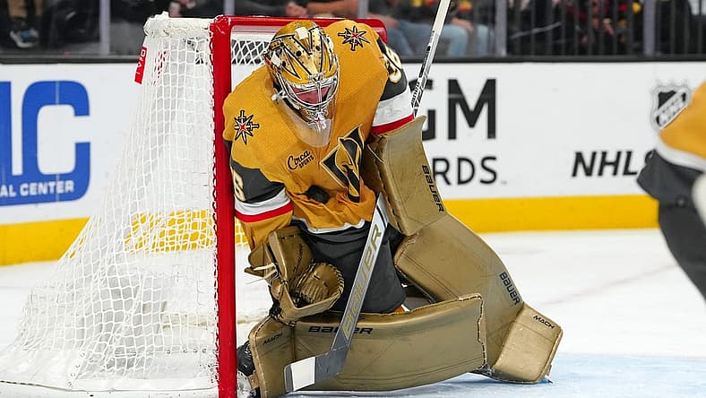 Nov 2, 2023; Las Vegas, Nevada, USA; Vegas Golden Knights goaltender Logan Thompson (36) absorbs a Winnipeg Jets shot during the second period at T-Mobile Arena. Mandatory Credit: Stephen R. Sylvanie-USA TODAY Sports