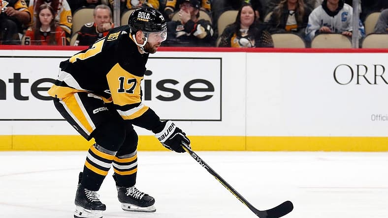 Oct 30, 2023; Pittsburgh, Pennsylvania, USA; Pittsburgh Penguins right wing Bryan Rust (17) skates with the puck against the Anaheim Ducks during the first period at PPG Paints Arena. Mandatory Credit: Charles LeClaire-USA TODAY Sports