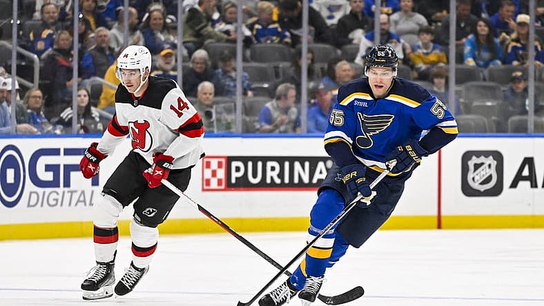 Nov 3, 2023; St. Louis, Missouri, USA;  St. Louis Blues defenseman Colton Parayko (55) controls the puck against the New Jersey Devils during the second period at Enterprise Center. Mandatory Credit: Jeff Curry-USA TODAY Sports