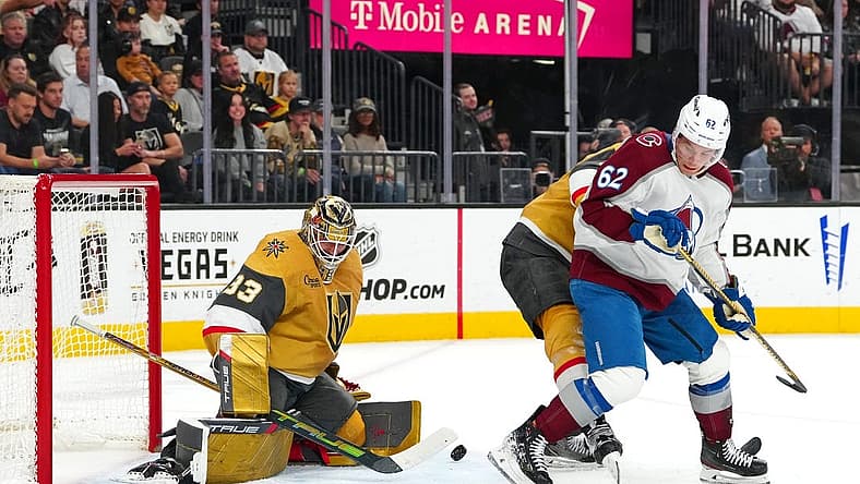 Nov 4, 2023; Las Vegas, Nevada, USA; Vegas Golden Knights goaltender Adin Hill (33) makes a save as Colorado Avalanche left wing Artturi Lehkonen (62) looks for a deflection during the first period at T-Mobile Arena. Mandatory Credit: Stephen R. Sylvanie-USA TODAY Sports