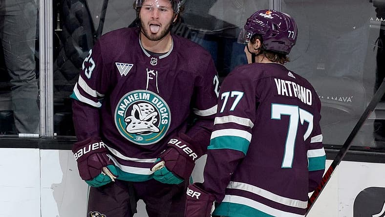 Nov 5, 2023; Anaheim, California, USA; Anaheim Ducks center Mason McTavish (23) celebrates with right wing Frank Vatrano (77) after scoring during the third period against the Vegas Golden Knights at Honda Center. Mandatory Credit: Jason Parkhurst-USA TODAY Sports