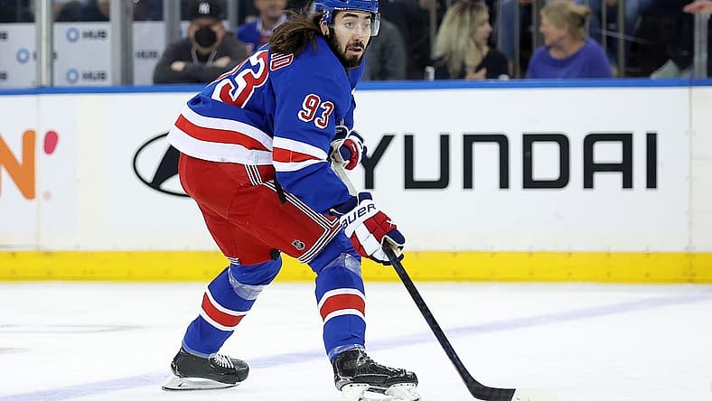 Nov 7, 2023; New York, New York, USA; New York Rangers center Mika Zibanejad (93) controls the puck against the Detroit Red Wings during the first period at Madison Square Garden. Mandatory Credit: Brad Penner-USA TODAY Sports