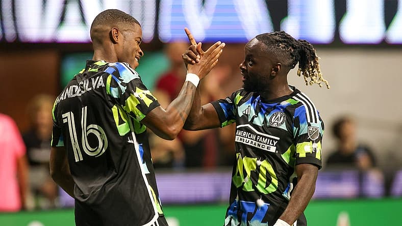 Nov 7, 2023; Atlanta, Georgia, USA; Atlanta United forward
Xande Silva (16) celebrates with midfielder Tristan Muyumba (8) after scoring a goal in the first half against Columbus Crew at Mercedes-Benz Stadium. Mandatory Credit: Brett Davis -USA TODAY Sports