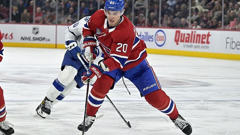 Nov 7, 2023; Montreal, Quebec, CAN; Montreal Canadiens forward Juraj Slafkovsky (20) plays the puck during the third period of the game against the Tampa Bay Lightning at the Bell Centre. Mandatory Credit: Eric Bolte-USA TODAY Sports