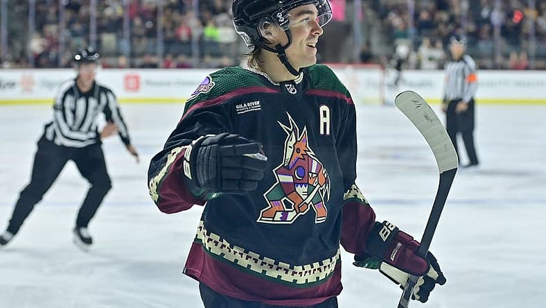 Nov 7, 2023; Tempe, Arizona, USA; Arizona Coyotes right wing Clayton Keller (9) celebrates after scoring a goal in the second period against the Seattle Kraken at Mullett Arena. Mandatory Credit: Matt Kartozian-USA TODAY Sports