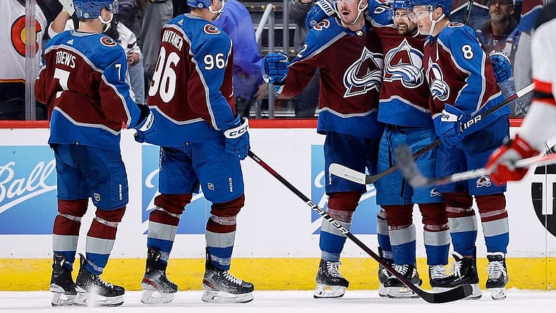 Nov 7, 2023; Denver, Colorado, USA; Colorado Avalanche center Ryan Johansen (12) celebrates his goal with left wing Tomas Tatar (90) and defenseman Cale Makar (8) and right wing Mikko Rantanen (96) and defenseman Devon Toews (7) in the third period against the New Jersey Devils at Ball Arena. Mandatory Credit: Isaiah J. Downing-USA TODAY Sports