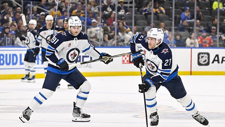Nov 7, 2023; St. Louis, Missouri, USA; Winnipeg Jets left wing Nikolaj Ehlers (27) controls the puck against the St. Louis Blues during the third period at Enterprise Center. Mandatory Credit: Jeff Curry-USA TODAY Sports
