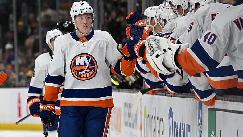 Nov 9, 2023; Boston, Massachusetts, USA; New York Islanders right wing Simon Holmstrom (10) celebrates with his teammates after scoring a goal against the Boston Bruins during the third period at the TD Garden. Mandatory Credit: Brian Fluharty-USA TODAY Sports