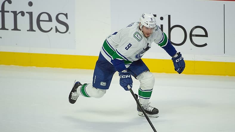 Nov 9, 2023; Ottawa, Ontario, CAN; Vancouver Canucks center J.T. Miller (9) skates with the puck in the third period against the Ottawa Senators at the Canadian Tire Centre. Mandatory Credit: Marc DesRosiers-USA TODAY Sports