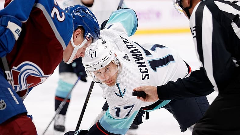 Nov 9, 2023; Denver, Colorado, USA; Seattle Kraken center Jaden Schwartz (17) waits for the puck to drop against Colorado Avalanche center Fredrik Olofsson (22) in the third period at Ball Arena. Mandatory Credit: Isaiah J. Downing-USA TODAY Sports