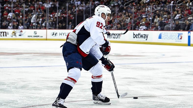 Nov 10, 2023; Newark, New Jersey, USA; Washington Capitals center Evgeny Kuznetsov (92) skates with the puck against the New Jersey Devils during the first period at Prudential Center. Mandatory Credit: John Jones-USA TODAY Sports